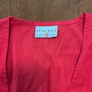 Red peaches scrub jacket size XS